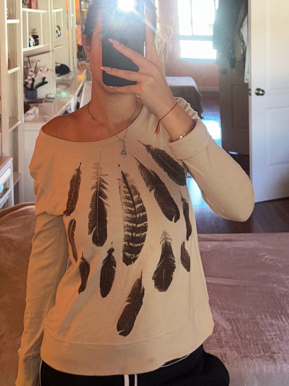 Tucker Tate Cream off the shoulder sweatshirt with black feather print
